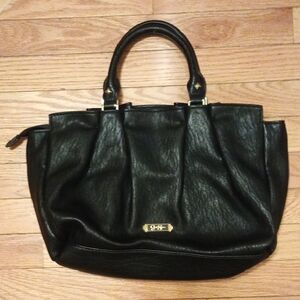 Black Handbag With Gold Accents By Jessica Simpson